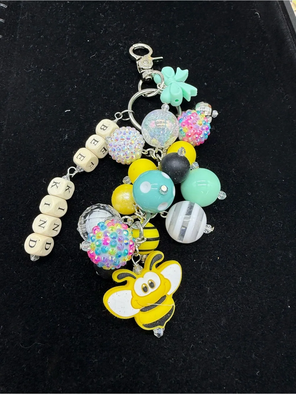 👑Adorned Crown Jewelry purse bag charm keychain bee kind Cha cha bauble